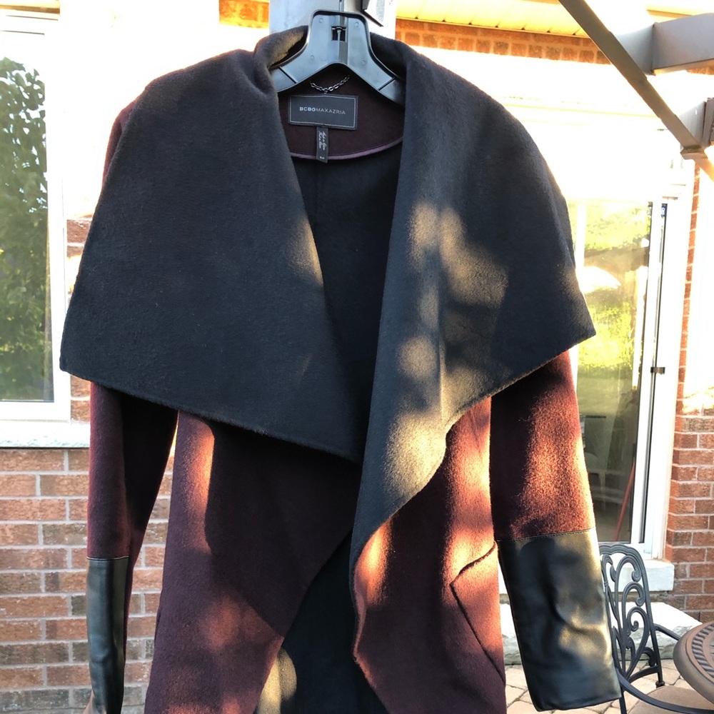 BCBG  , leather detail . burgundy and black